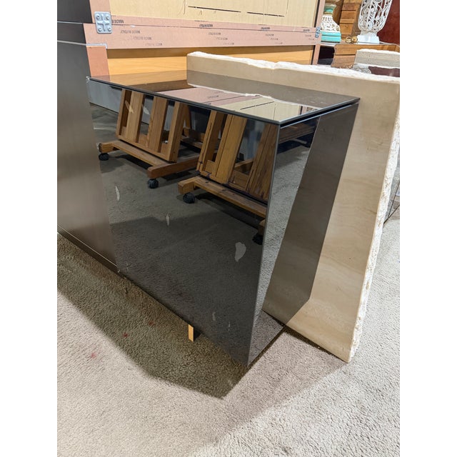 Make a dramatic statement with this vintage Brutalist-style tessellated stone and black mirrored buffet, a striking...