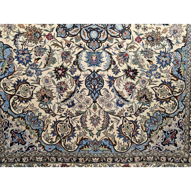 A beautifully handwoven vintage Tabriz-design Persian area rug, hand-knotted in India during the third quarter of the 20th...