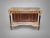 A stunning, museum-quality 19th-century French console table, masterfully executed in the elegant Louis XVI style. This...
