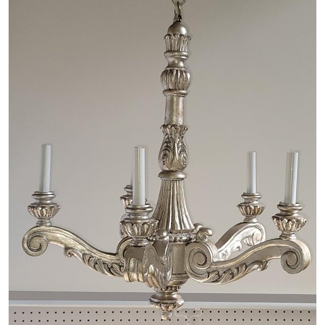 5 Light, Carved Wood Chandelier French Style. Finished Applied by Mario Lighting Inc in Silver Leaf Finish. Professionally...