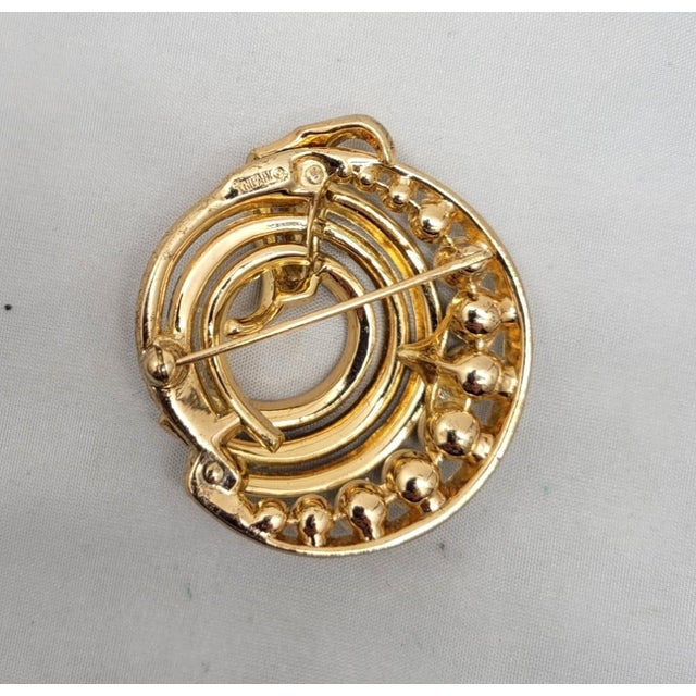 Mid-Century Modern Vintage Signed Crown Trifari Goldtone Faux-Pearl & Clear Rhinestone Baguette Circle Brooch For Sale - Image 3 of 6