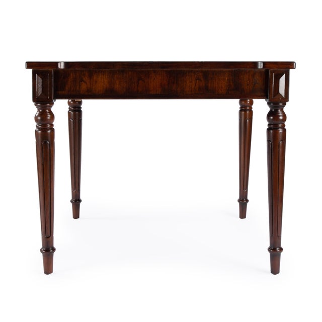 Play a variety of games on this stylish table that is veneered with a Cherry finish. The top inset has a game board for...