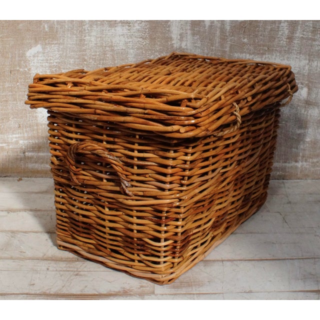 Superb Wicker Log Basket. Made from wicker, with two twisted wicker handles on either side of the basket, rope fittings...