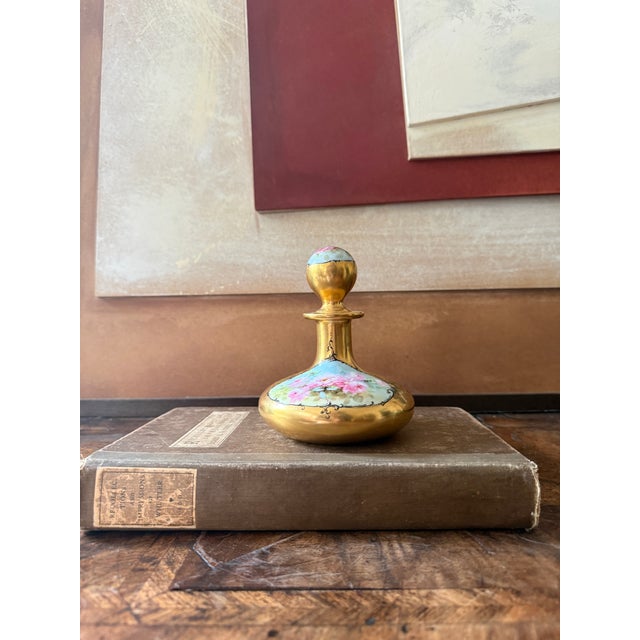 This beautiful antique Austrian porcelain perfume bottle dates to approximately 1900 and features lavish gold decoration...