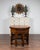 An Italian walnut octagonal center table from the mid-19th century (or earlier), with geometrical inlay. We have a near...