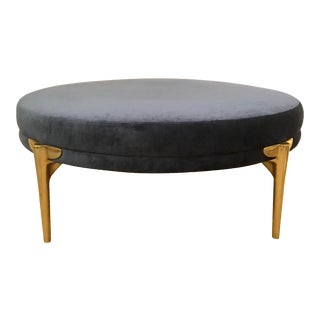 Arteriors Home Modern Blue Velvet and Brass Finished Round Cocktail Ottoman For Sale