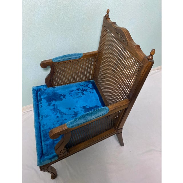 Sinking into the plush velvet cushions of this Regency style vintage Kimball chair may inspire you to purchase a smoking...