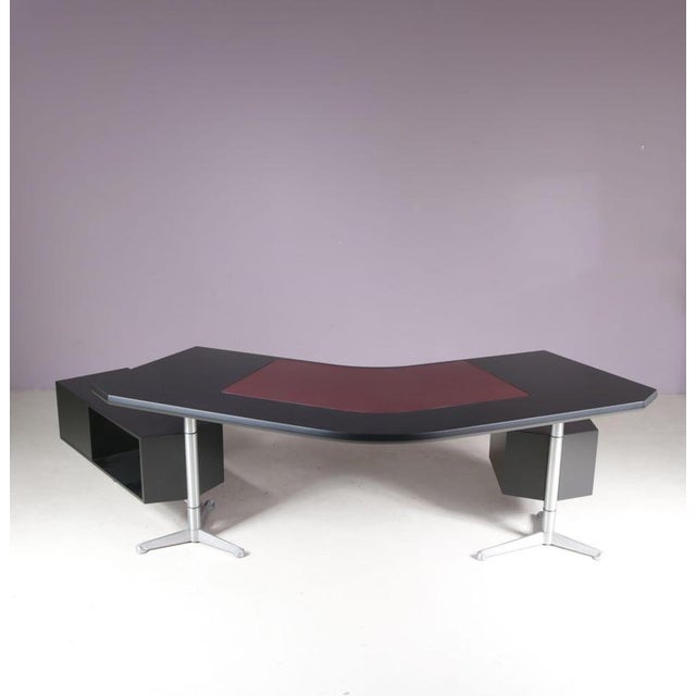 1950s desk designed by osvaldo borsani for tecno, milano, italy. A refined example of italian mid-century modern design,...