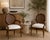 Elevate your space with this beautifully restored pair of vintage French Provincial cane back accent chairs. Featuring...