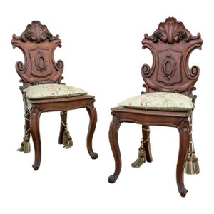 19th Century Continental Cartouche Form Carved Walnut Valet Hall Chairs—A Pair