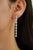 These elegant linear drop earrings feature 2.84 carats of sparkling mixed-cut diamonds set in 14K white gold. All diamonds...