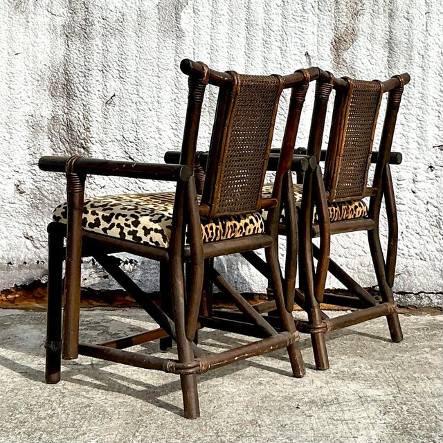 Bring effortless boho charm to your space with this pair of Vintage Boho Rattan and Cane Chairs, inspired by the iconic...