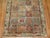 An accent size early 20th century Persian Malayer rug with a garden box design in an assortment of colors Measures: 4'5" x...