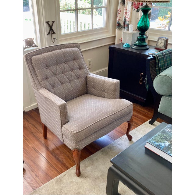 This handsome side chair has beautiful details and could work in any room. The fabric is also handsome, but is starting to...