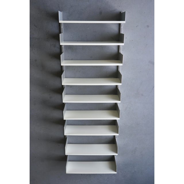 A very useful tall version of the well-known model 606 Universal system designed by Dieter Rams for Vitsoe. This is an...