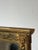 Impressive antique giltwood mirror featuring rich classical ornamentation and sculptural lion mask corner details. The...