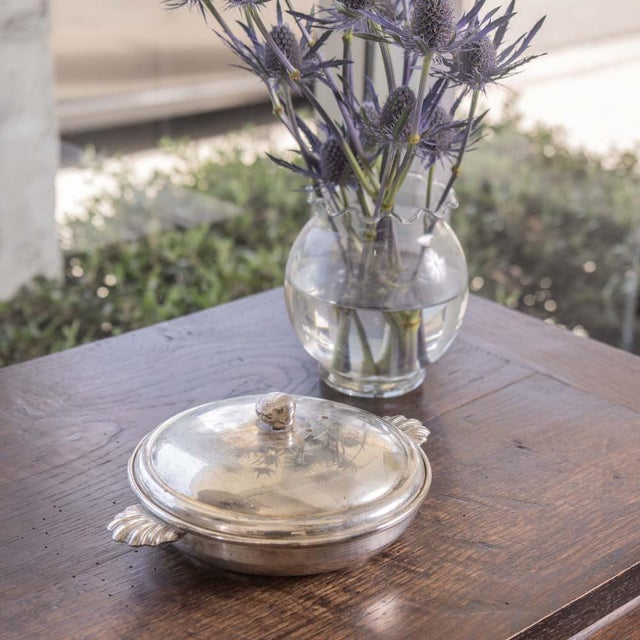 Beautiful Art Deco alpaca silver bowl with lid from Spain, 1940s. Low bowl with lovely decorative shell handles and etched...