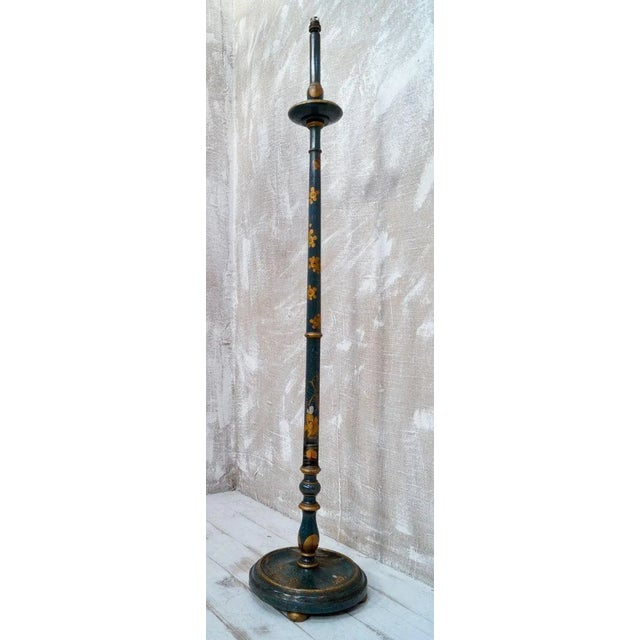 A very stylish blue chinoiserie standard floor lamp, with a turned wooden column on a circular base with bun feet, hand...