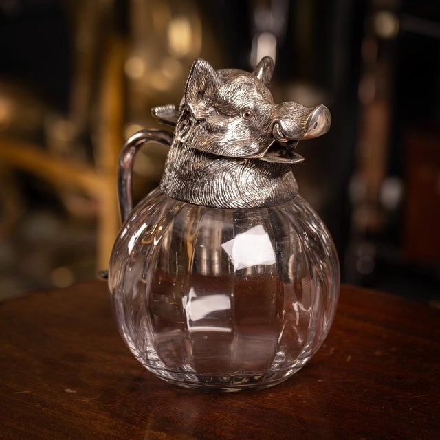 A mid 20th century spanish made jug / carafe, crafted in the 1970's by valenti. The jug showcases a bulbous glass body...