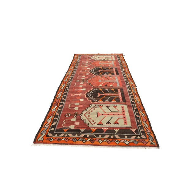 Vintage handwoven decorative kilim rug from Kars region of Turkey. Approximately 50-60 years old. In very good condition.