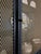 Mid 20th Century Modern Hollywood Regency-Inspired Ebony Display Cabinet With Brass Mesh Door For Sale - Image 4 of 11