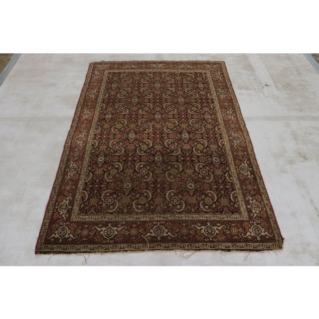 Made with hand-knotted wool circa 1890-1900, this 4x6 antique Persian rug is a rich and exciting new addition of the...
