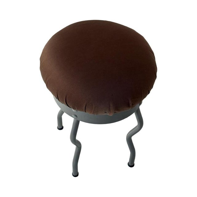 Vintage postmodern design stool made from aluminum and cotton upholstery. Design by Paul Ivar Ledang. In good condition...