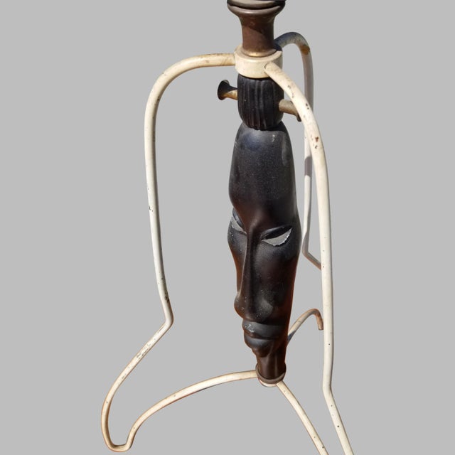 Vintage Mid-Century Modernist Iron Leg Table Lamp w/African Face Have had this lamp for several years and felt it had a...