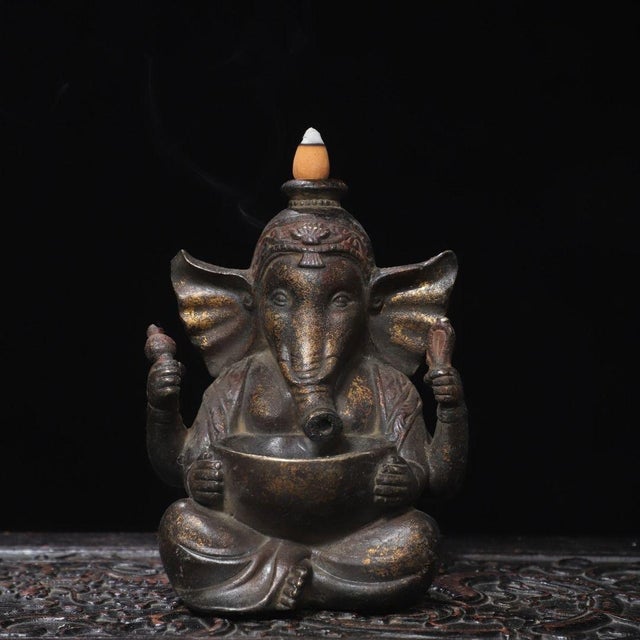 This is a charming and functional vintage Chinese gilt brass figure of Ganesha (象鼻财神), the elephant-headed Hindu deity...