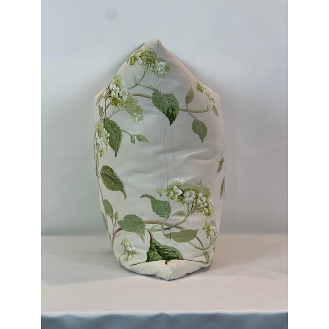 Custom-tailored 20” feather/down pillow in Cowtan & Tout “Summerby” leaf green. These pillows have serged seams and hidden...