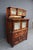 Rare American Dental Company dental sterilizer cabinet in solid mahogany. Features original glass-front upper cabinets...