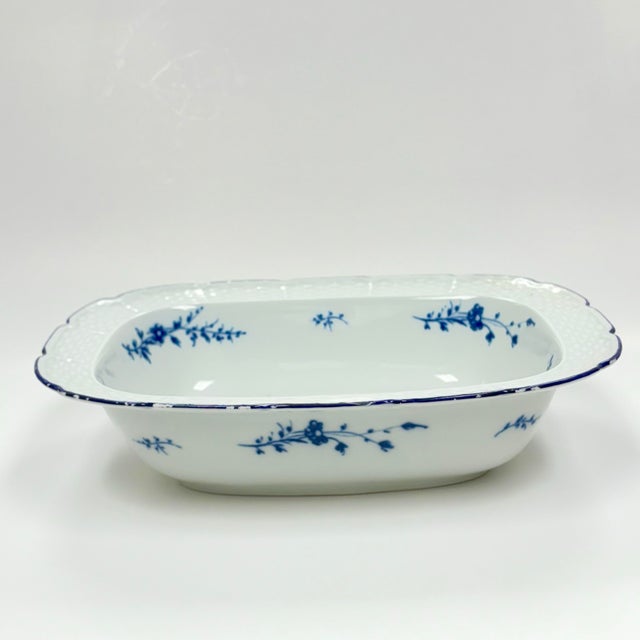 This elegant vintage oval vegetable bowl by Limoges Ceralene features the refined Blue Carnation pattern, inspired by...