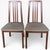 A handsome pair of mid century high back dining chairs by Morris of Glasgow, showcasing the clean architectural lines and...