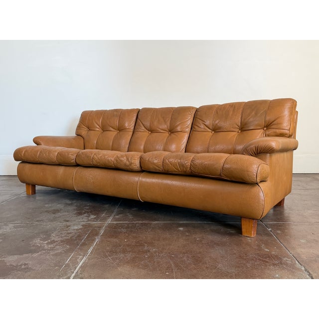 1970s camel brown leather Arne Norell "Mexico" Sofa in good vintage condition, some scuffs, scratches and patina on the...