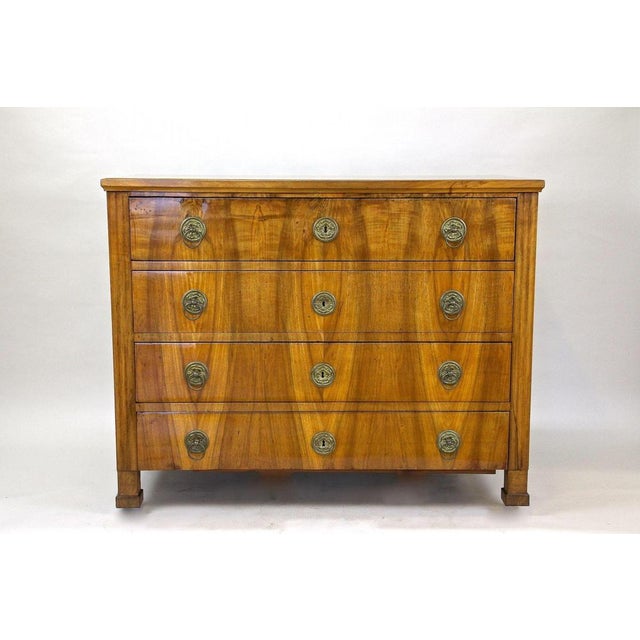 Outstanding nutwood Biedermeier chest of drawers/ secretary desk from the famous period in Austria around 1830. Veneered...