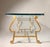 A nice vintage coffee table made in Spain. Dates to the mid-century. Nice coil work with hammered design. In the manner of...
