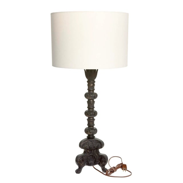 Hand painted cast white metal candlestick lamp with shell motif & decorative column which sit on three decorative feet,...