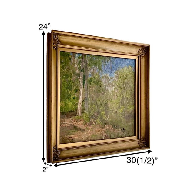 This Art is an antique oil painting by John Robinson Tait depicting a woodland landscape, framed in a gilt frame. This...