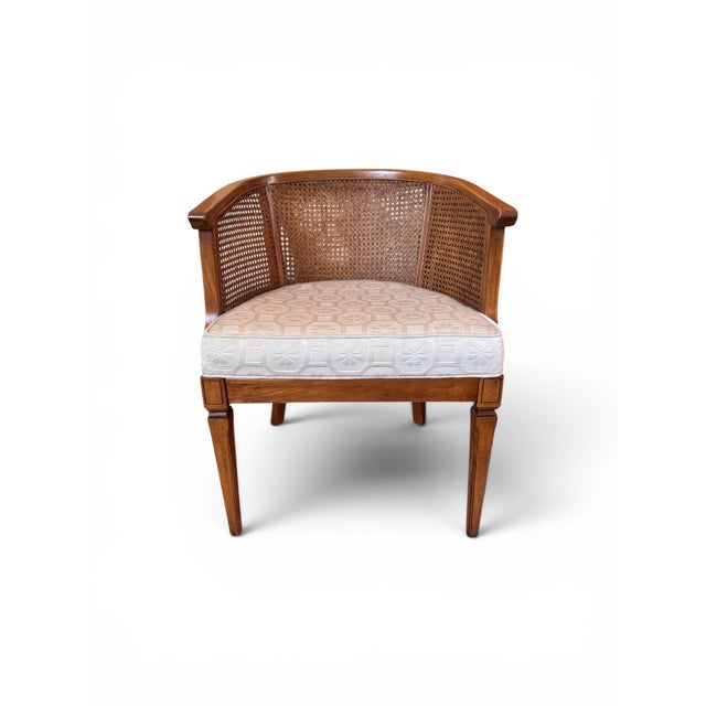 Regency style cane backed tub chair with white patterned upholstery. All caning intact. Great condition, 22 3/4"w x 18" d...