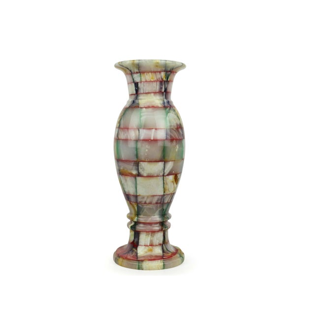 This handcrafted multi-onyx patchwork vase is a masterful display of natural artistry and meticulous stonework. Expertly...