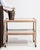 A practical oak bar cart mounted on casters for easy mobility. The natural wood construction adds warmth while maintaining...