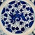 An early 18th century Dutch Delftware charger, hand painted in rich cobalt blue on a white ground. The center features a...