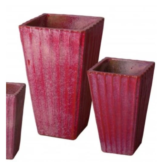 This fluted planter set has a gorgeous ceramic finish.The planter has a red base color with white glaze applied over the...