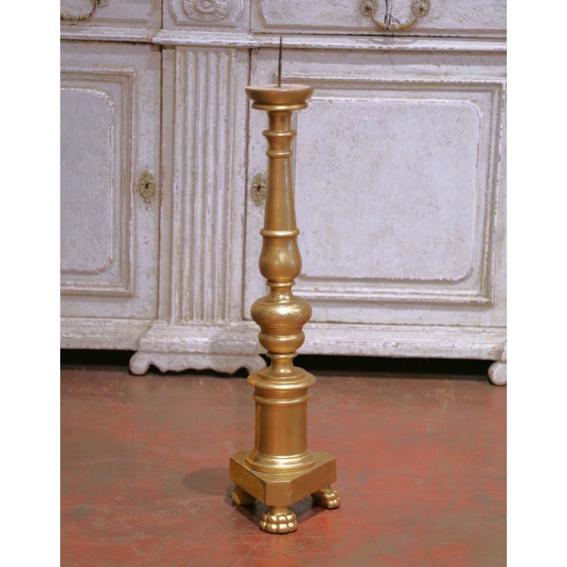 Dress a console, mantel, or vignette with this tall and sculptural Italian giltwood candlestick crafted around 1860....