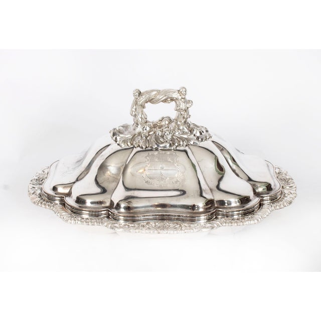 This is an exquisitely high-quality and rare antique pair of English Old Sheffield Plate, silver plated on copper, domed...