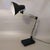 1970s stunning black gorgeous architect table lamp by arteluce in metal with a double-articulated arm and an adjustable...