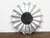A vintage Italian silver leaf sunburst mirror from the mid 20th century, with radiating effects and beveled mirror plate....