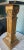 Very heavy and solid. Gold finish pedestal, topped with marble. Corinthian detail at top and bottom of the column.