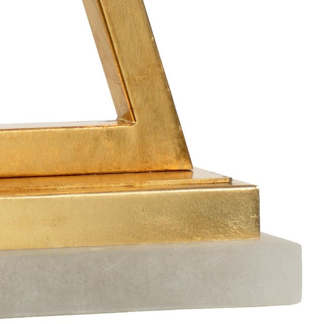 Gold Leaf X Shaped Iron With Natural White Albaster Base, Designed By Claire Bell. Clean with a dry cloth
