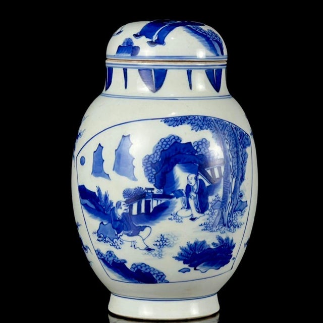 This charming vintage porcelain lidded jar features a classic, slightly squat "lotus seed" form with a domed cover. The...